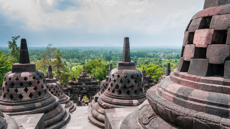 Stupas on the top of Borobudur close to Yogyakartaの写真素材