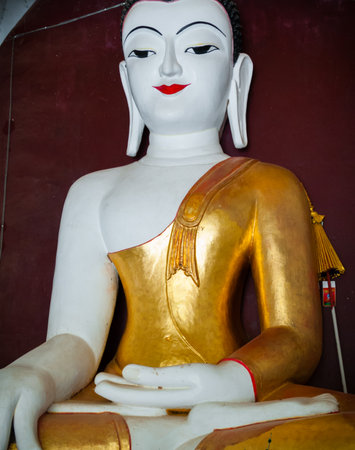 Marble Buddha Statue sitting at a temple in Myanmar Burmaの写真素材