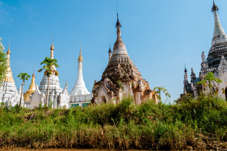 White Pagoda under a blue sky at Inle Lake Burma Myanmar