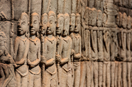 Detail of stone encarving at a temple in Angkor watの写真素材