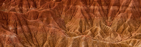 Detail of Drought red orange sand stone rock formation in Tatacoa desert, Huila in Colombiaの写真素材
