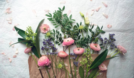 Flower pattern of pink ranunculus and greeneryの写真素材