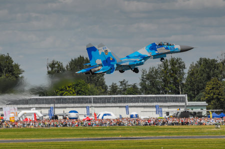 RADOM, POLAND - AUGUST 25: Ukrainian SU-27 display during Air Show 2013 event on August 25, 2013 in...