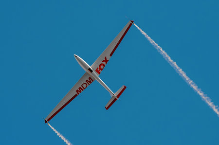 RADOM, POLAND - AUGUST 25: Aerobatic group formation "Zelazny" at blue sky during Air Show 2013 event on August 25, 2013 in Radom, Polandのeditorial素材