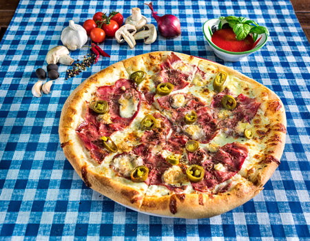 Ham and jalapeno white pizzaの写真素材