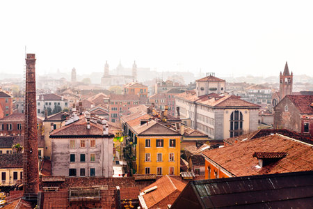 Small town from a rooftop in foggy weatherの写真素材