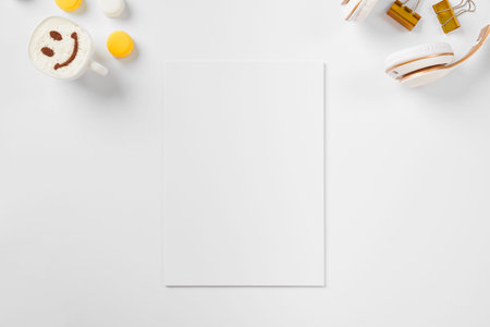 Top view feminine workspace with blank notepad pageの写真素材