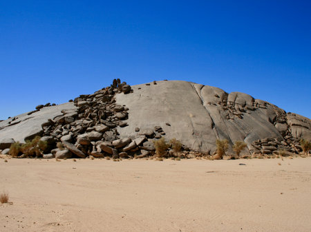 A curiously rounded rockの写真素材