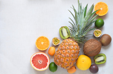 Fresh fruits variety top view on white background, cope space