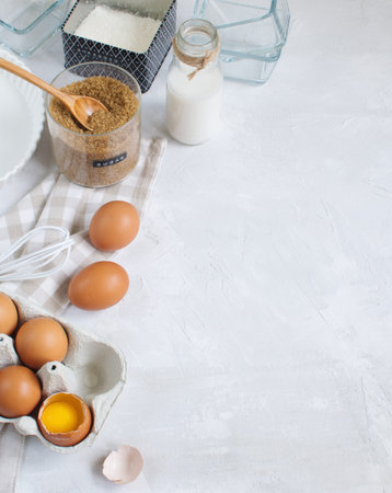 Baking background with ingredients and utensils, top view, copy space