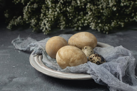 Spring easter minimal rustic style concept - organic naturally dyed easter eggs, qual eggs, curcuma,...