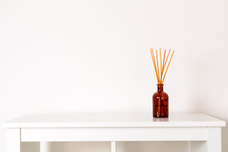 Minimal composition, scandinavian nordic hygge style, home interior - scent aroma diffuser with...