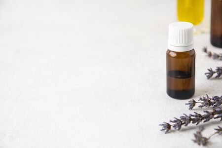 Selective focus on glass lavender essential oil bottleの写真素材
