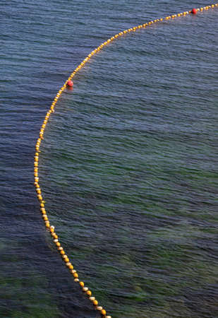 yellow line on the seaの写真素材