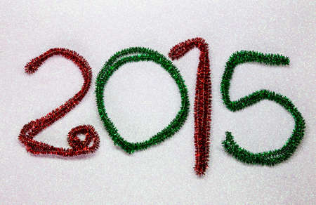 new year figures on plain white shiny backgroundの写真素材