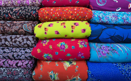 Printed fabric on a bazaar waiting for saleの写真素材