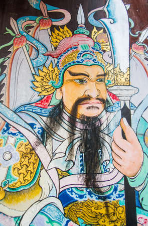 Ancient Artwork on a door in Wat Phoの写真素材
