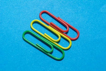 Paper clips of different colors used in the office.の写真素材