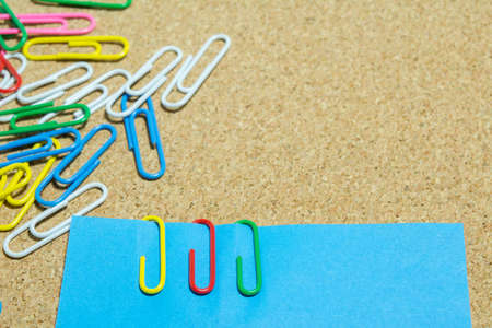 Paper clips of different colors used in the office.の写真素材