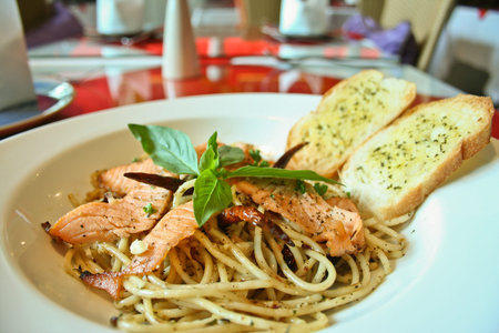 spaghetti salmon and black pepperの写真素材