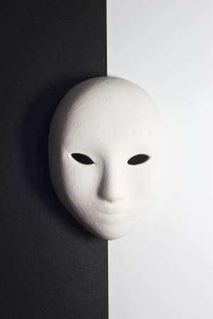 plaster mask in studio, when compared to the good or bad の写真素材