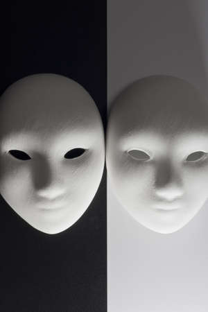 plaster mask in studio, when compared to the good or bad の写真素材
