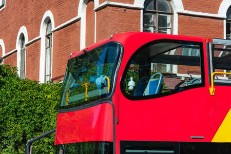 The second floor of a double-decker tourist bus, the windows of the bus during the tour.の写真素材