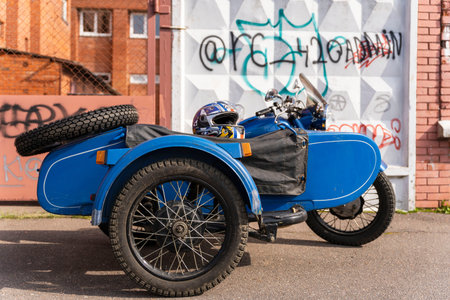 SOSNOVY BOR, RUSSIA-September 11.2021: Soviet motorcycle Ural with a sidecar in the parking lot.