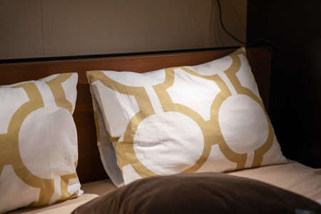 Pillows for sleeping on a home bed, bedroom furniture.の写真素材