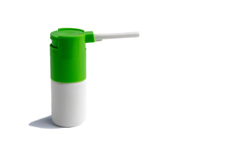 inhaler with medicine for throat disease isolated on a white backgroundの写真素材