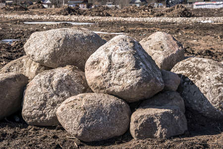 a pile of boulders on the site for the constructionの写真素材