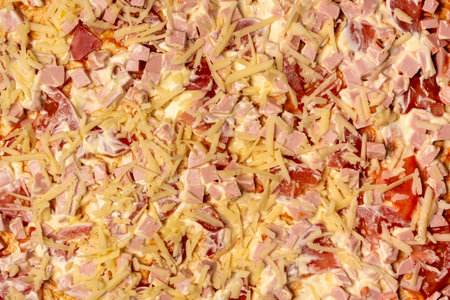 background of homemade pizza with sausage and cheeseの写真素材