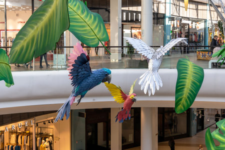 SAINT PETERSBURG, RUSSIA - MAY 21, 2022: mock-ups of flying parrots