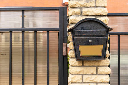 elegant mailbox on the door of a private houseの写真素材