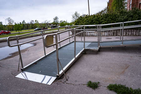 A ramp for people with disabilities near a public building.の写真素材