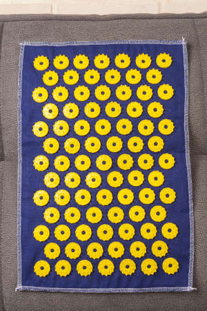 Acupuncture mat to maintain the health of the body. self-care at homeの写真素材