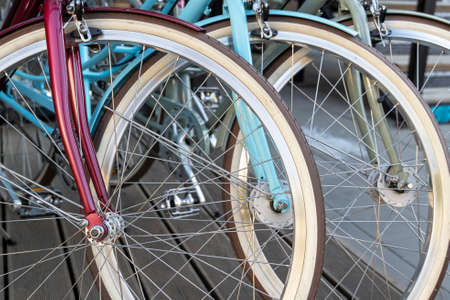 number of stylish bicycles for sale in a fashionable modern bike shopの写真素材