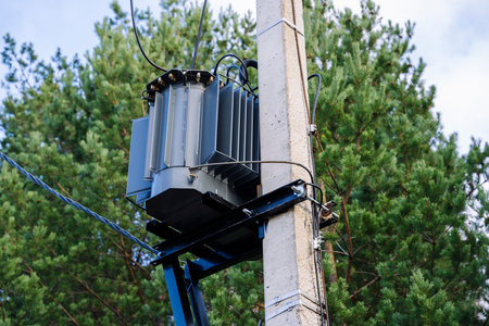 network transformer installed and fixed on a reinforced concrete pole