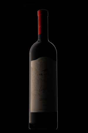 Sosnovy Bor, RUSSIA - DECEMBER 22, 2022: dark bottle of Askaneli wineのeditorial素材