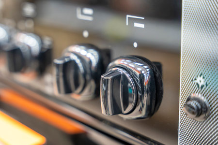 handle for turning on the burner of home kitchen stove. Home gas stoveの写真素材