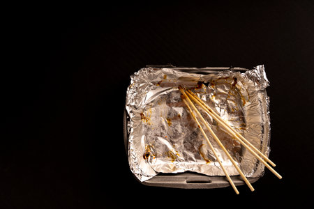 An empty plastic container for the delivery of a set of sushiの写真素材