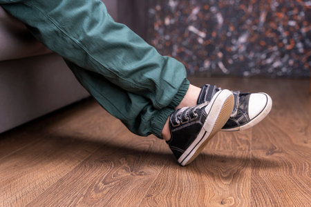 casual comfortable childrens clothing. pants and sneakersの写真素材