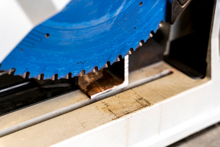 metal saw with tool cutting disc makes a cutの写真素材