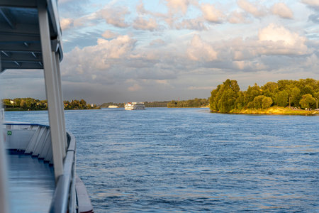 view from the deck of a sailing ship on the river and the ships going along it