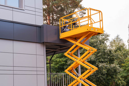 mobile lifting cradle. Construction scissor lift.