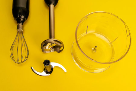 various whipping nozzles, a blender, a whisk, ready for mixing and cooking culinary masterpiecesの写真素材