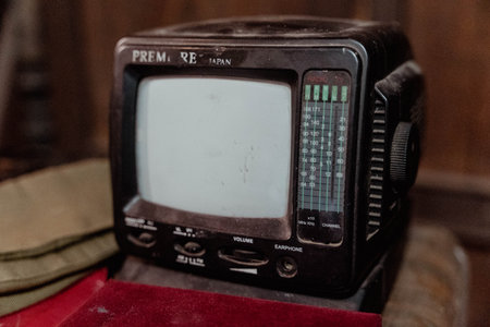 Pskov Region, Russia , July 21, 2024 - vintage television set sits quietly on a wooden surfaceのeditorial素材