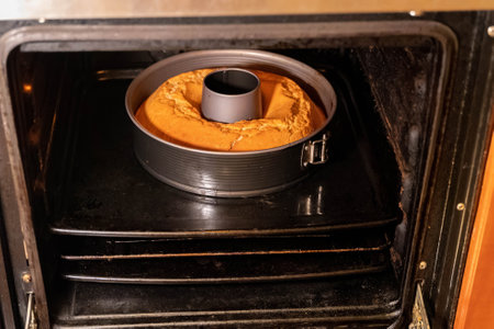 Baking a delicious homemade cake in the oven, cooking processの写真素材
