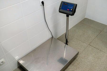 Weighing scale positioned on a sleek surface in a modern environmentの写真素材
