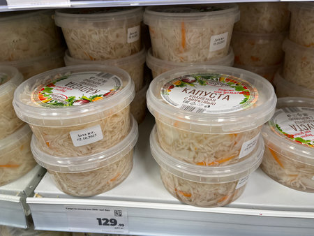 Russia, Sosnovy Bor, October 12, 2025 -Display of sauerkraut containers for purchase in a Russian storeのeditorial素材